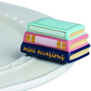 Nora Fleming mini: stack of books - retired